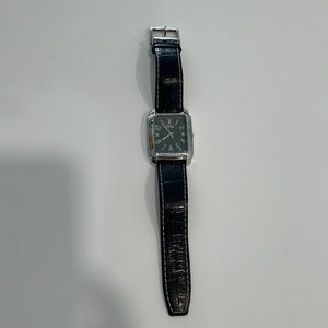 Kenneth Cole New York, Mens Leather stainless steel wristwatch. Fairly worn.